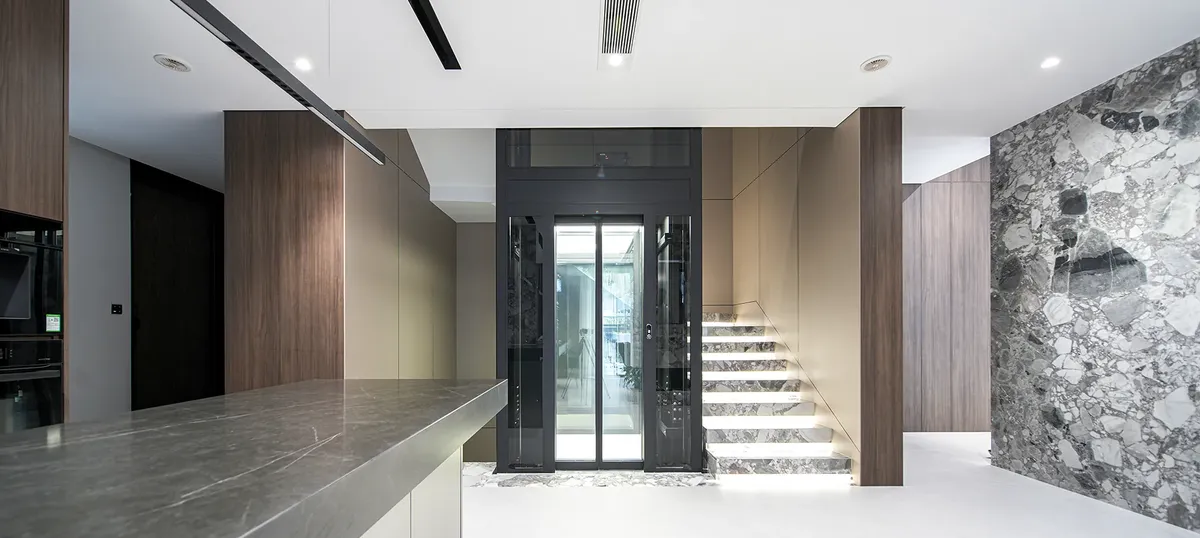 Youjia G1 home elevator with a glass-panelled cabin