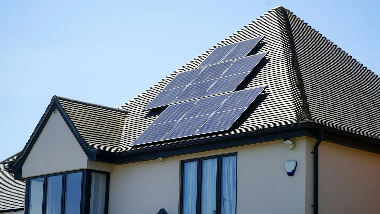 Solar panels mounted on a pitched roof