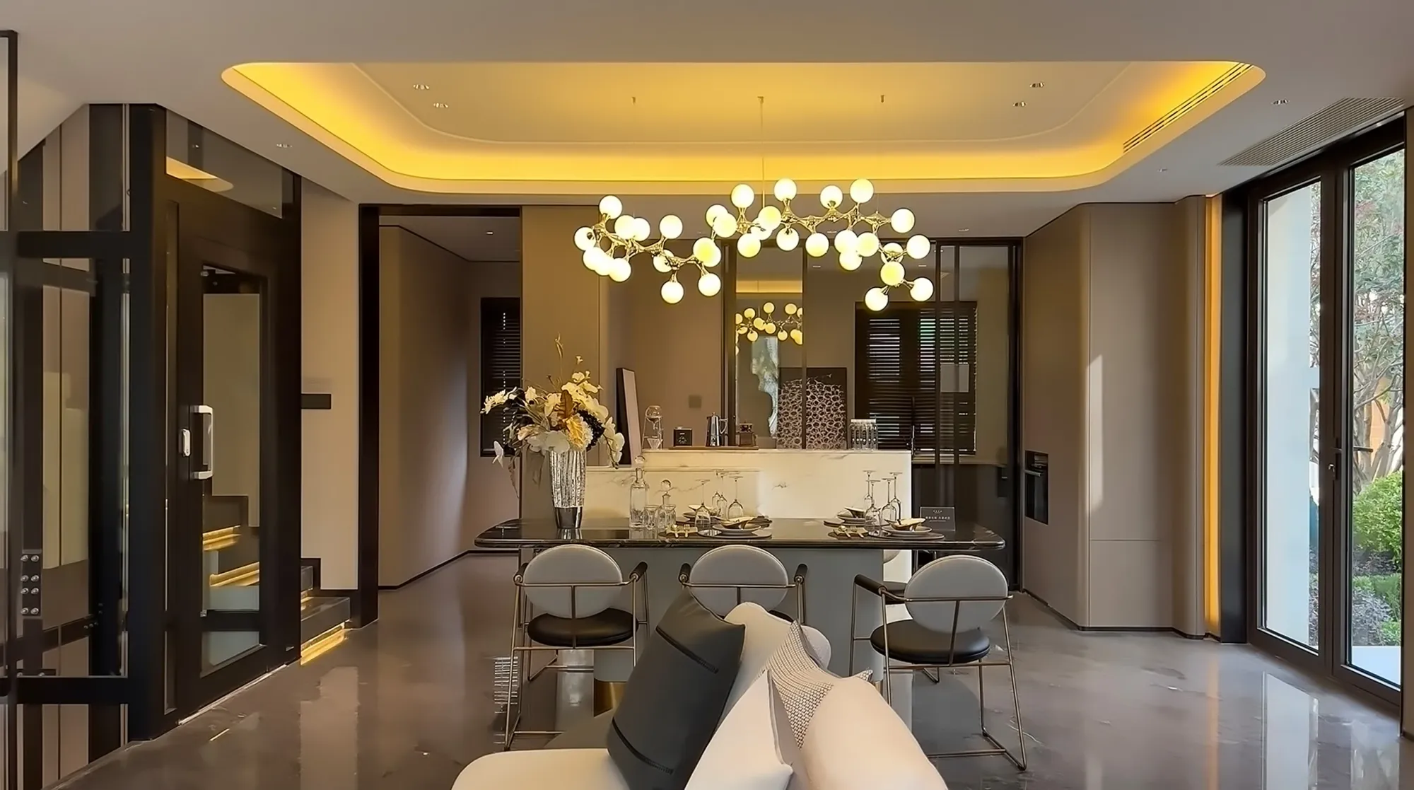 Yijia Q compact home elevator beside a dining area